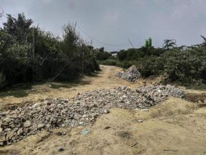 Illegal road, construction waste dumping on Aravali land near DLF-3